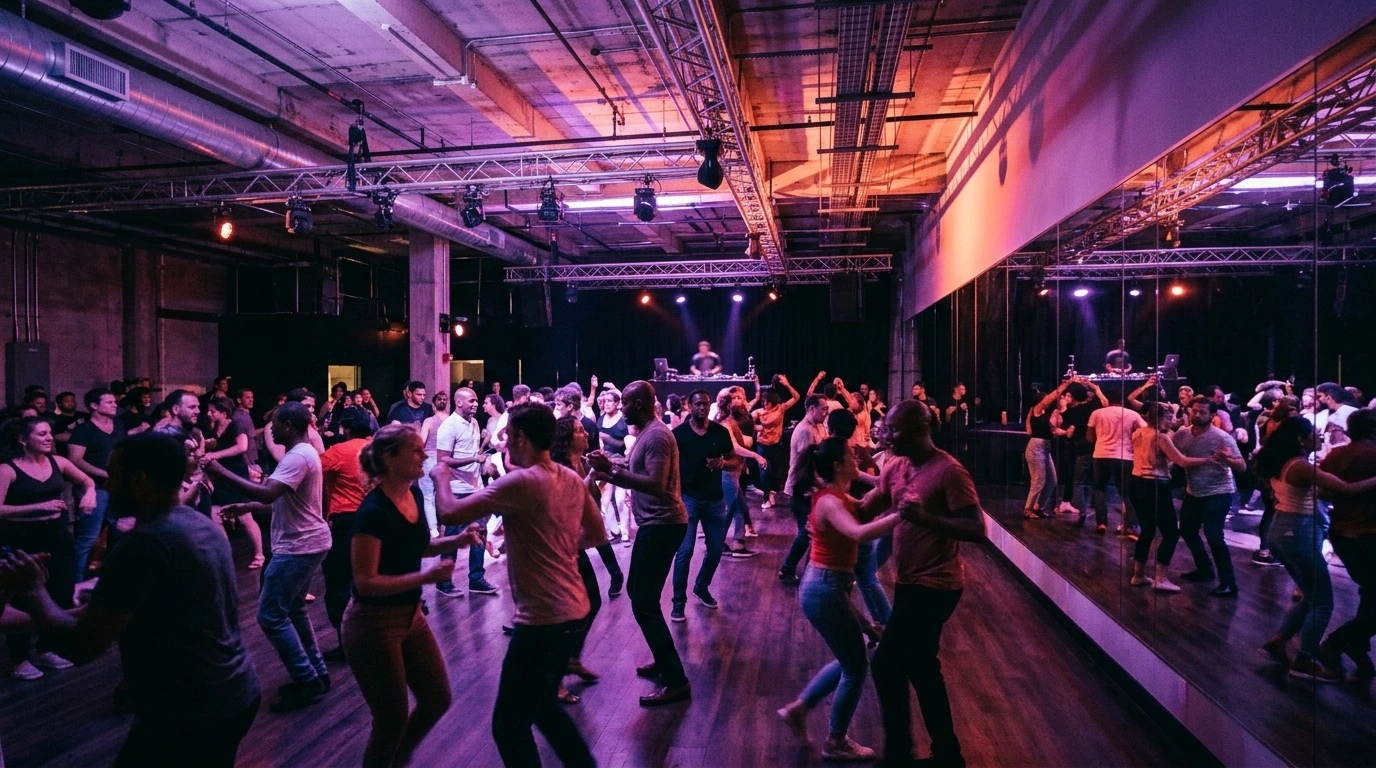 Dancers on a crowded floor at a salsa social in London